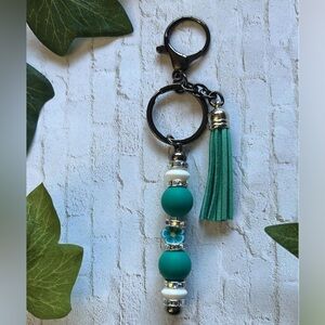 Green and White Key Holder with Beads and Tassel